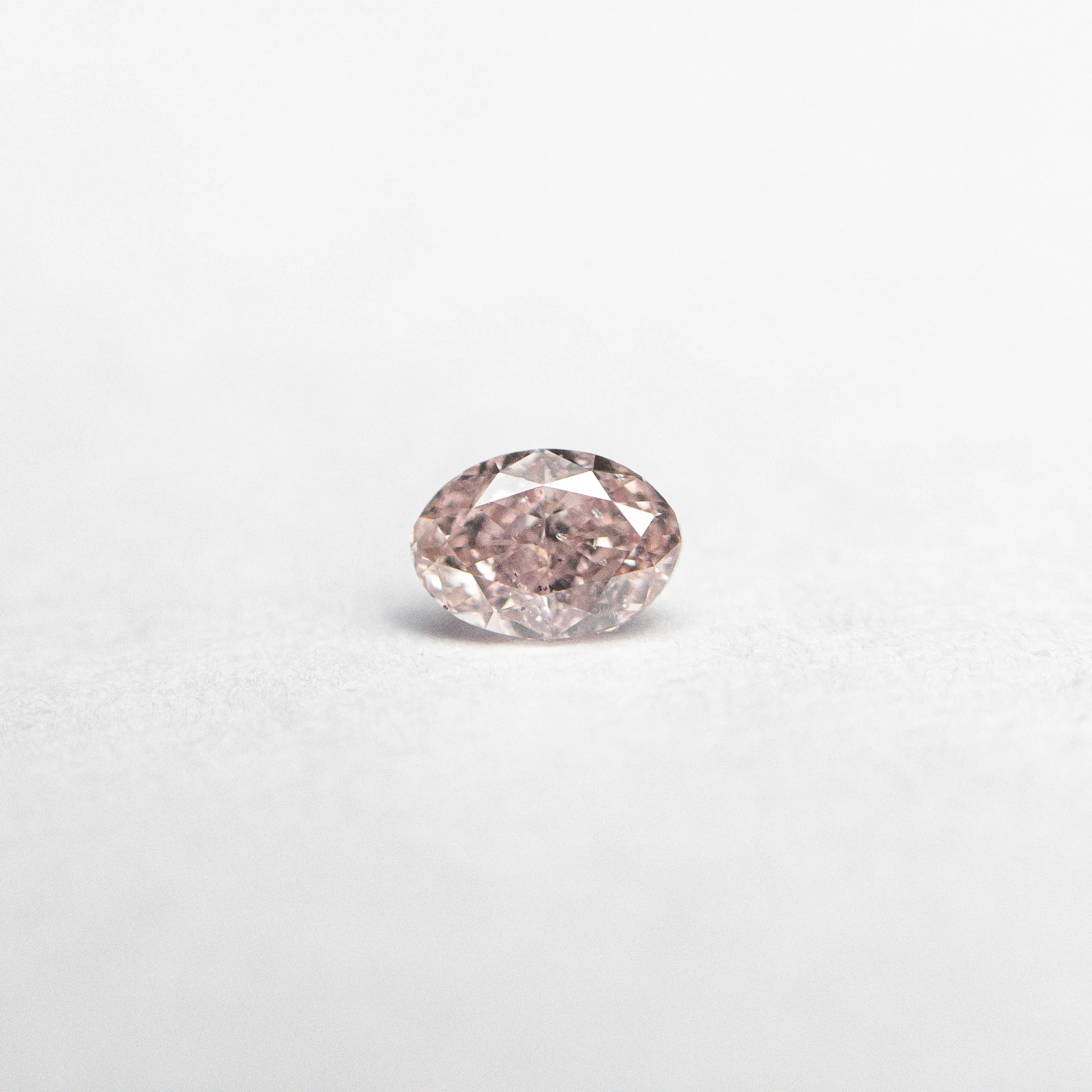 0.15ct 3.96x2.77x1.80mm GIA SI2 Fancy Pink Oval Brilliant  24089-01