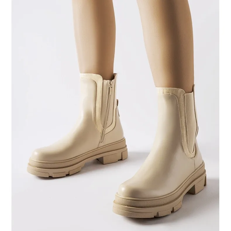 Beige sneakers with a massive Torin sole green