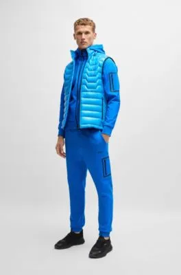 Cotton-blend tracksuit bottoms with decorative reflective logo