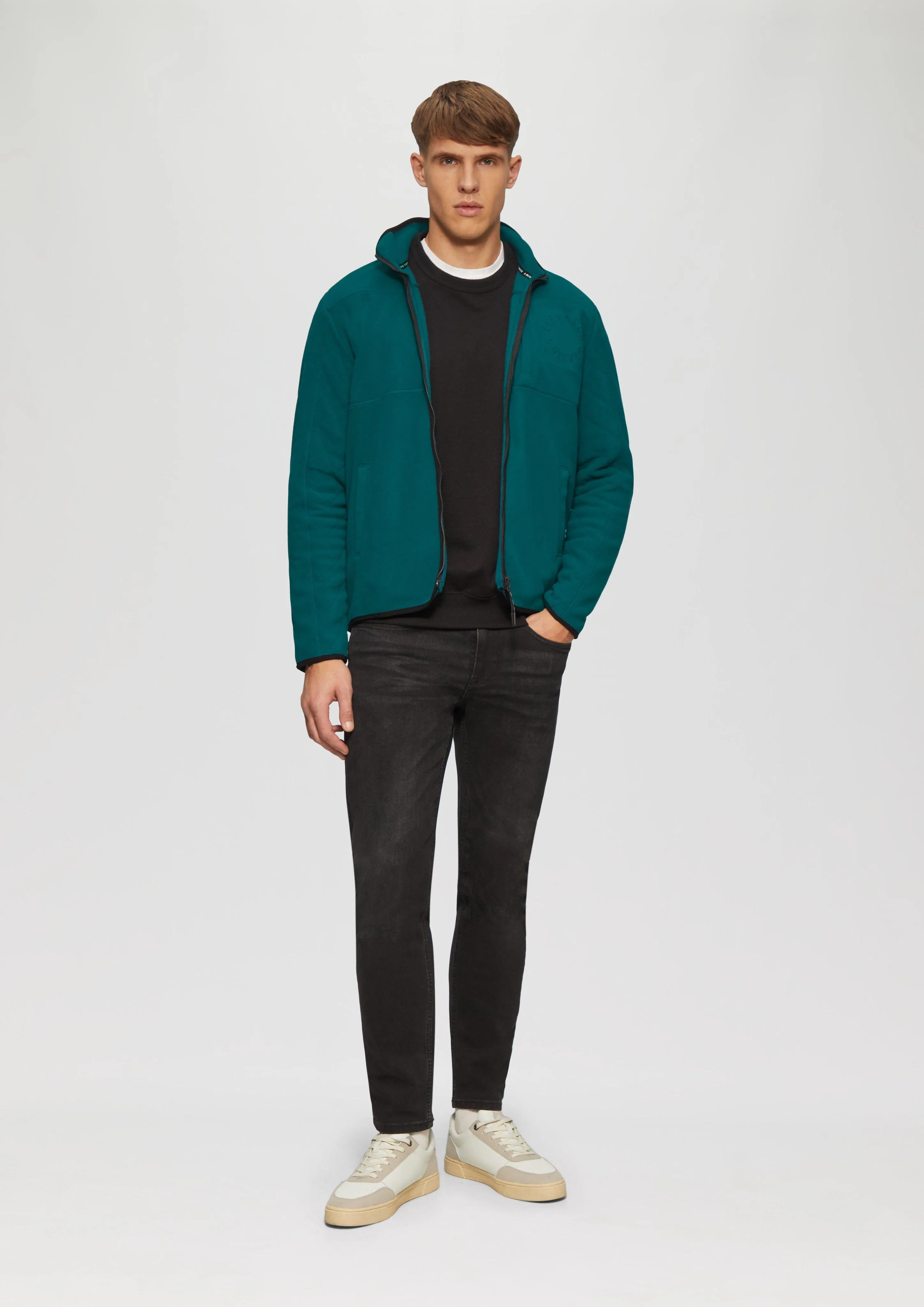 Fleece jacket in a mix of materials with topstitched details