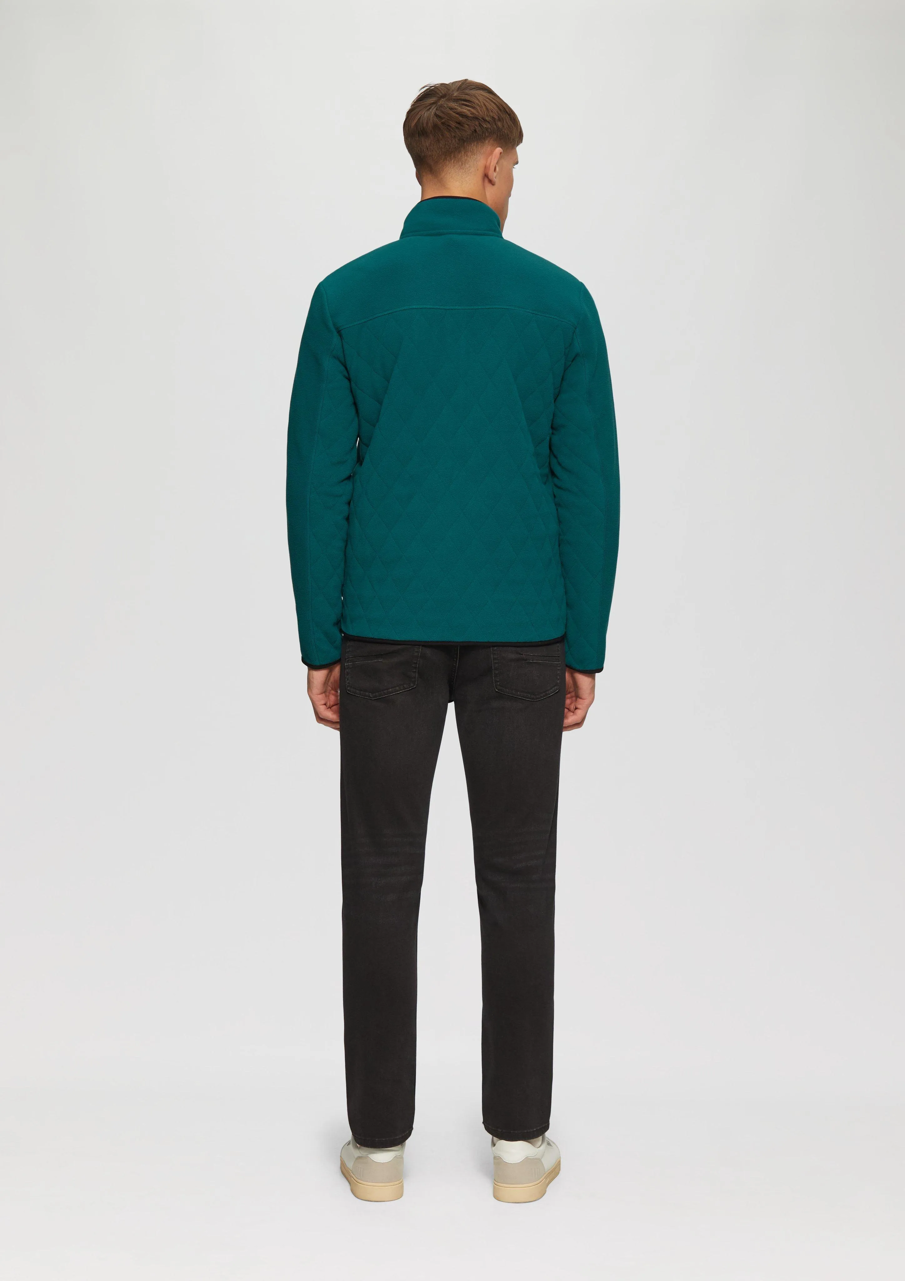 Fleece jacket in a mix of materials with topstitched details