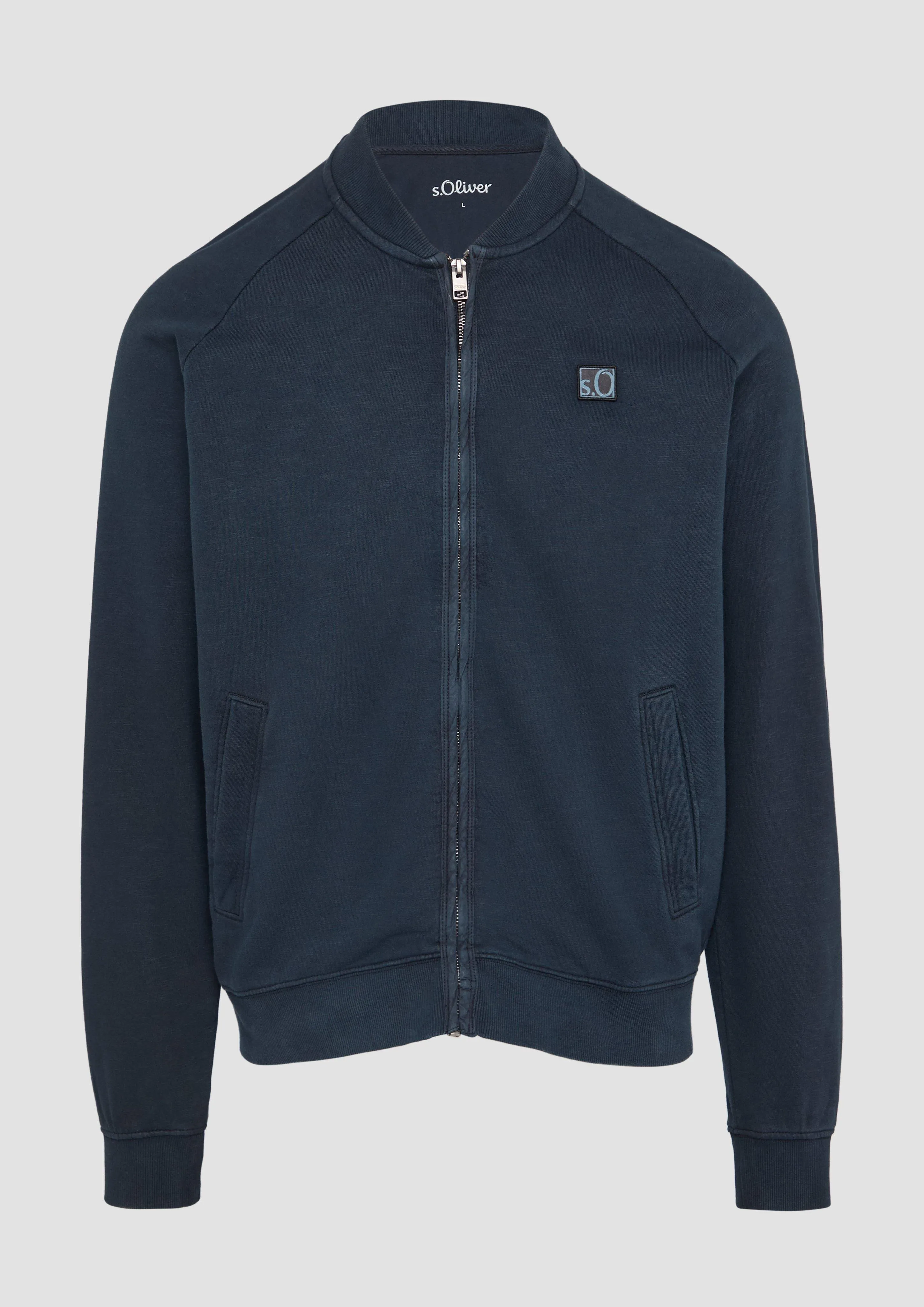 Jacket with a garment-dyed effect and raglan sleeves