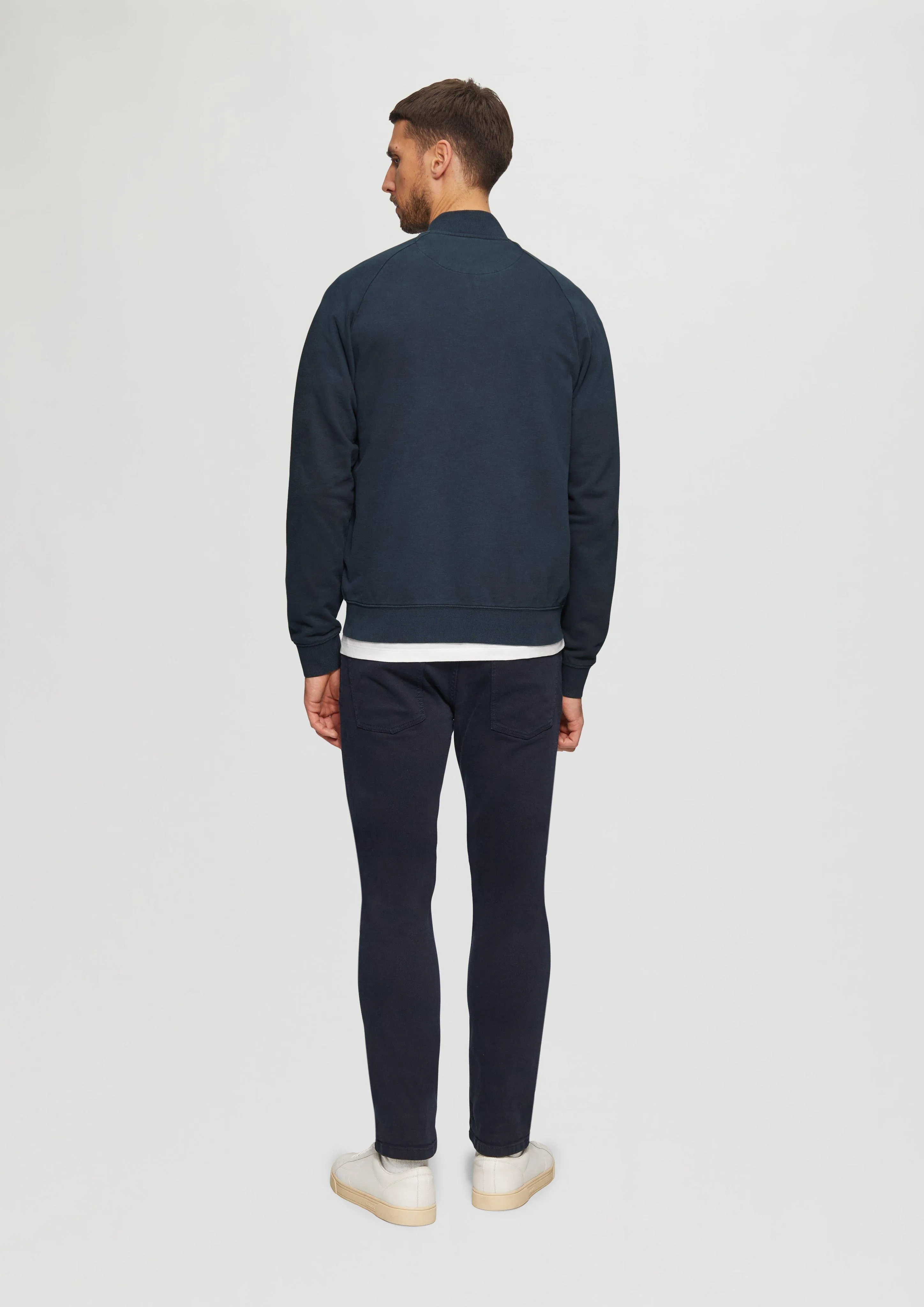 Jacket with a garment-dyed effect and raglan sleeves