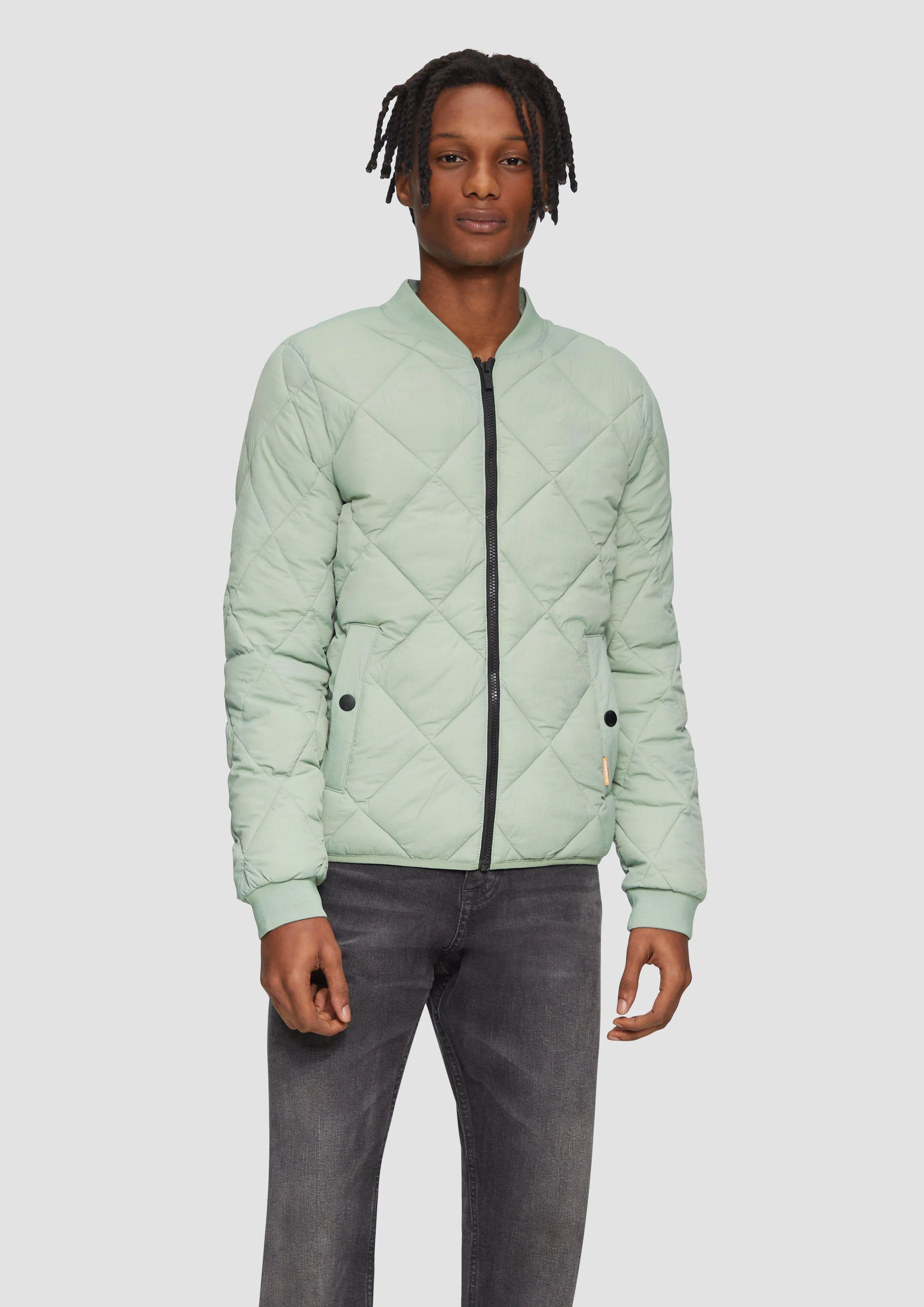 Quilted bomber jacket with a stand-up collar