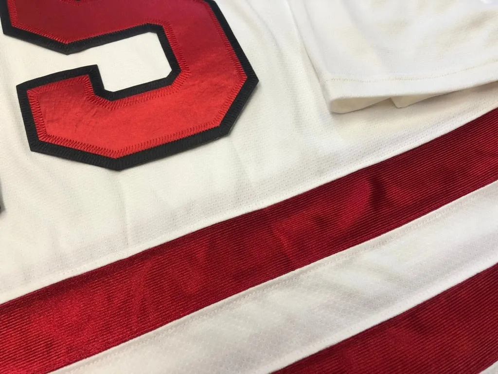 Red and White Hockey Jerseys with a Hip Embroidered Twill Logo