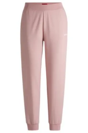 Relaxed-fit tracksuit bottoms with printed logo