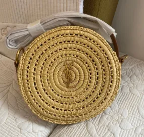 ROUND BAG IN RAFFIA AND VEGETABLE-TANNED LEATHER