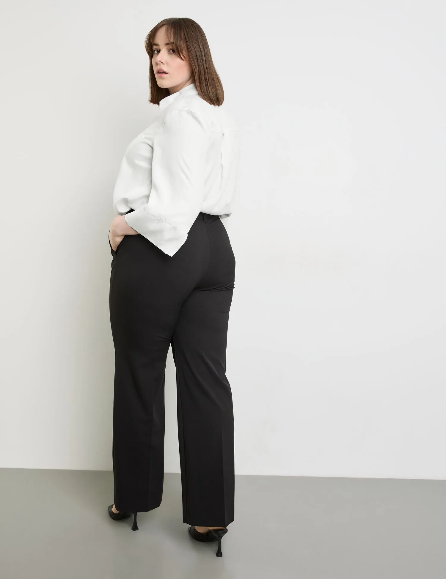 Smart pressed pleat trousers with a wide leg, Carlotta
