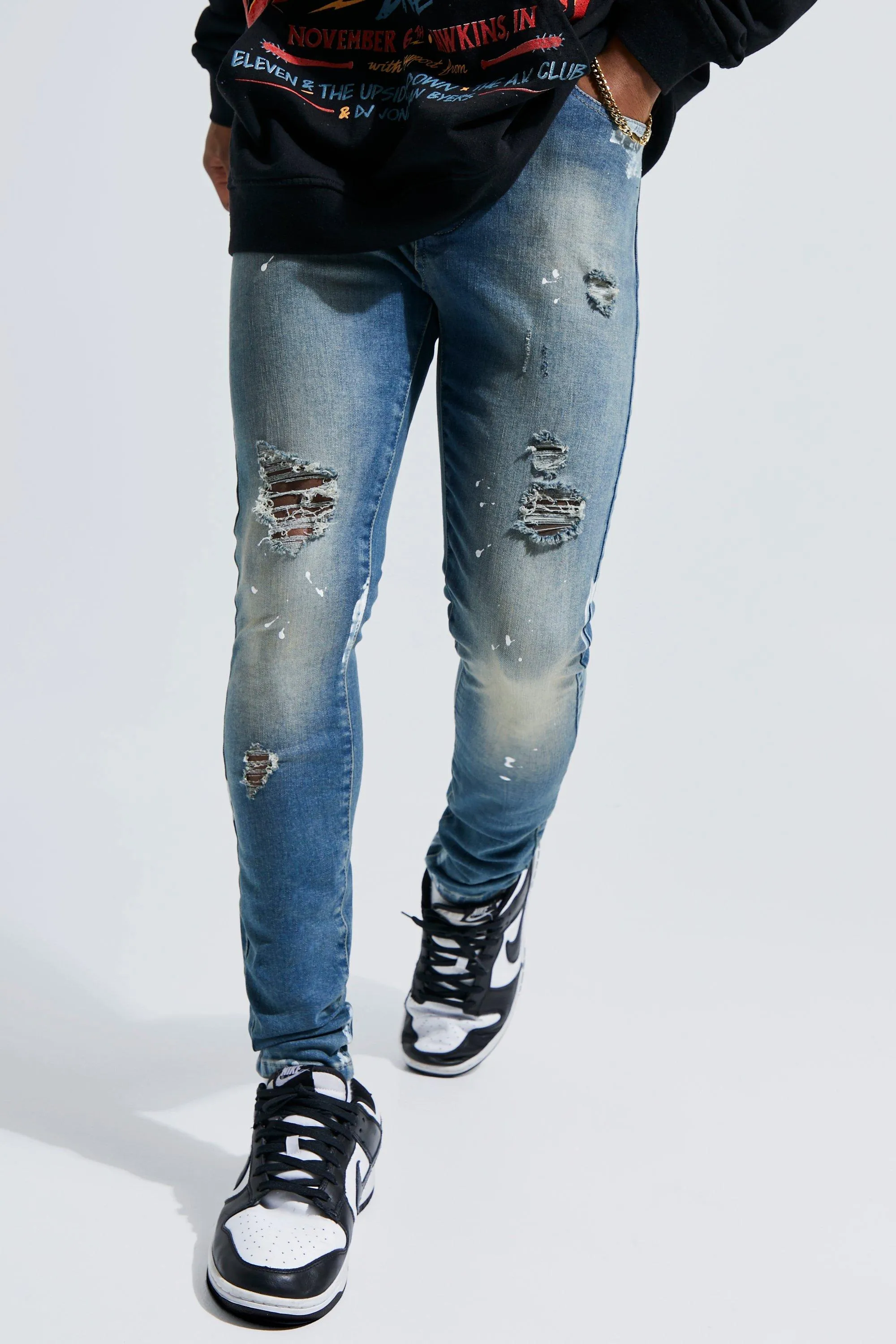 Super Skinny Ripped Paint Splatter Jeans